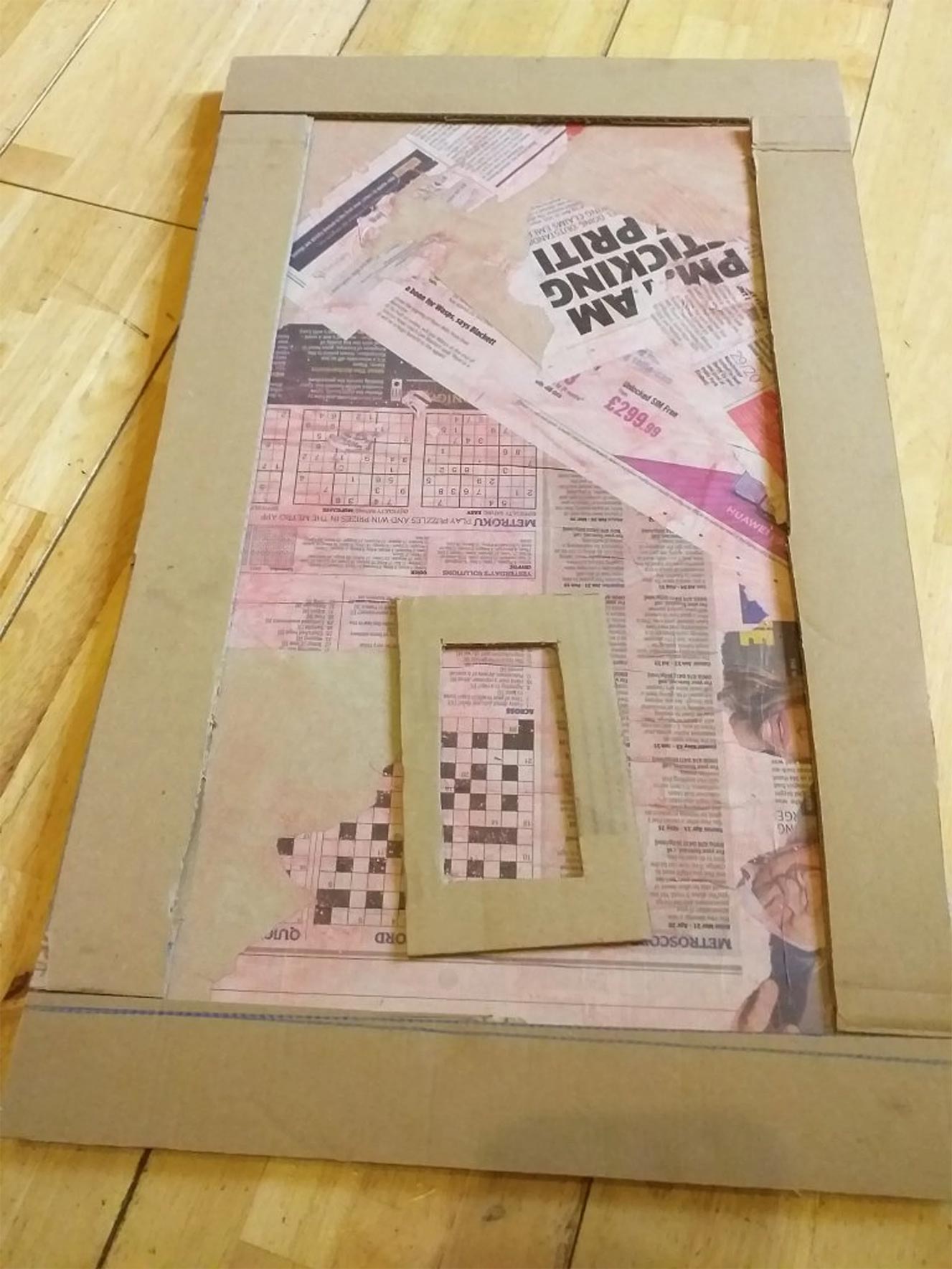The frame measured to fit on top of the canvas